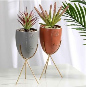 Set of 2 potted faux plants with stands